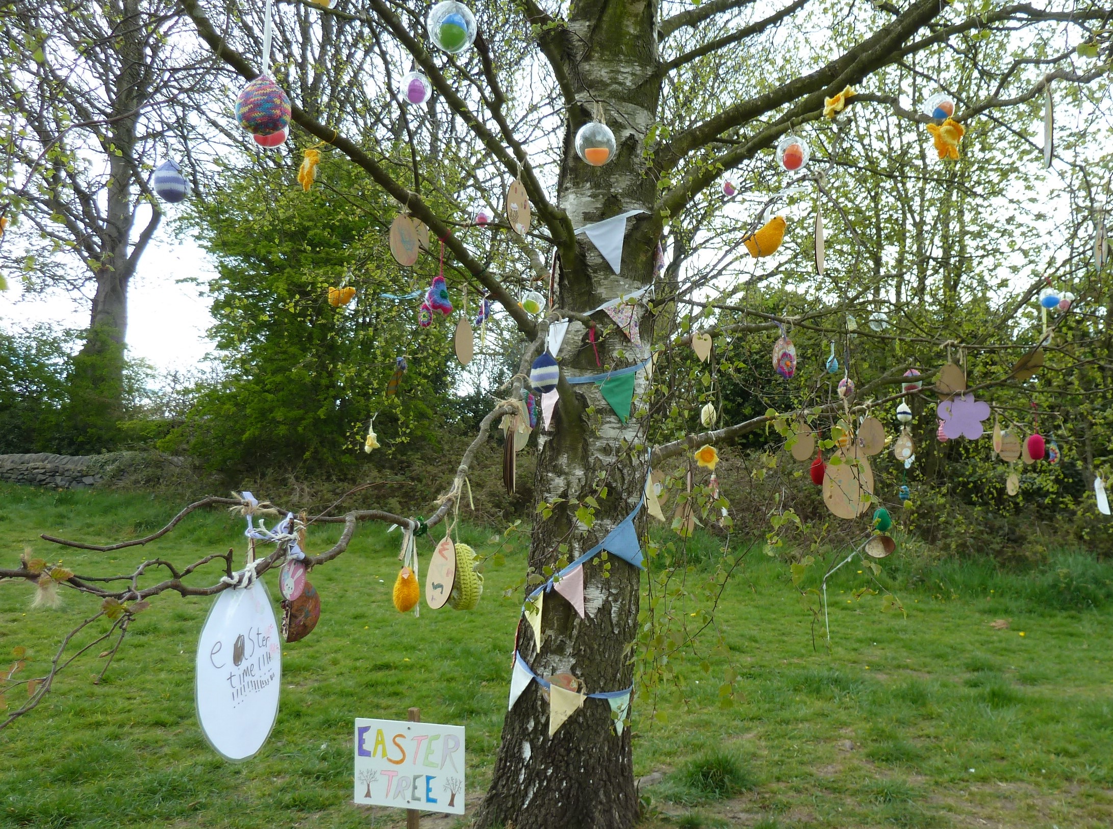decorated tree with bunting and baubles for Easter 